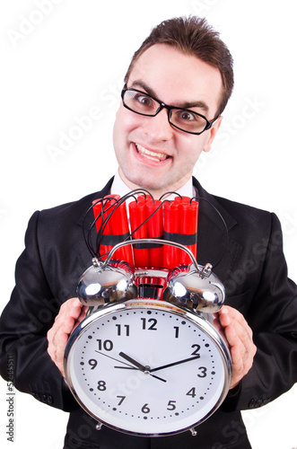 Photo: Man with time bomb isolated on white Man with time bomb isolated on white