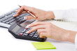 Hands working on the calculator