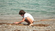 Video: Boy builds a free form sandcastle on the summer beach Boy builds a free form sandcastle on the summer beach
