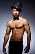 Muscular man in dark studio
