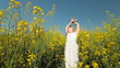Little Girl Enjoying the Summer in Yellow Meadow