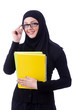 Young muslim woman with book on white