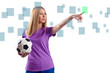 Woman with football pressing virtual buttons