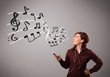 attractive young lady singing and listening to music with musica