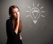 Foto: Young girl comming up with a light bubl idea sign Young girl comming up with a light bubl idea sign