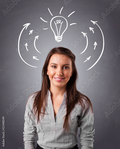 Photo: Pretty lady thinking with arrows and light bulb overhead Pretty lady thinking with arrows and light bulb overhead