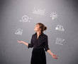 beautiful young woman juggling with statistics and graphs