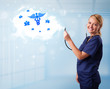 Young doctor with abstract cloud and medical icons