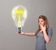 Beautiful lady holding realistic 3d light bulb