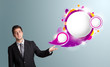 Handsome man presenting abstract speech bubble copy space