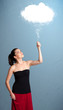 Foto: Beautiful lady holding cloud Beautiful lady holding cloud