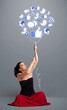 Foto: Pretty woman holding social icon balloon Pretty woman holding social icon balloon