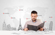 Businessman with world map and major landmarks of the world
