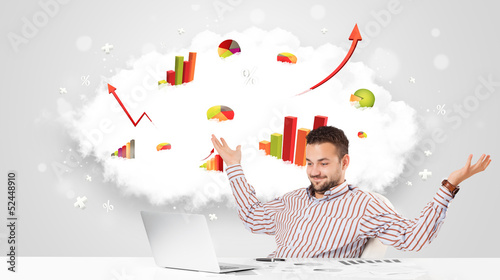 Photo: Handsome businessman with cloud in the background containing col Handsome businessman with cloud in the background containing col