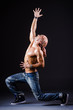 Dancer dancing in the dark studio