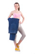 Woman in dieting concept with big jeans