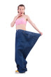 Woman in dieting concept with big jeans