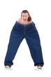 Woman in dieting concept with big jeans