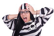 Prisoner in striped uniform on white