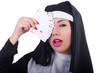 Photo: Nun playing cards on white Nun playing cards on white