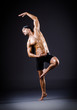 Dancer dancing in the dark studio