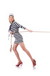 Woman sailor in tug of war concept