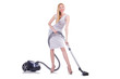 Young woman with vacuum cleaner on white