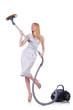 Young woman with vacuum cleaner on white