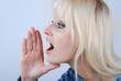 Foto: Young blonde woman with a cry Young blonde woman with a cry