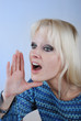 Foto: Young blonde woman with a cry Young blonde woman with a cry