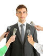 Photo: Interview with a young businessman, isolated on white Interview with a young businessman, isolated on white