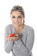 Model Released. Young Woman Holding Red Chillis'