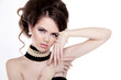 Jewelry and Hairstyle. Fashion portrait of beautiful woman with