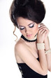 Beautiful Brunette Girl with hairstyle and make up isolated on w