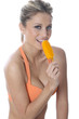 Model Released. Young Woman Eating Ice Lolly