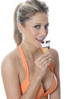 Model Released. Young Woman Eating Ice Cream Cornet