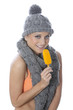 Model Released. Young Woman Eating Ice Lolly