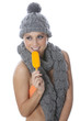 Model Released. Young Woman Eating Ice Lolly