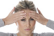 Model Released. Young Woman With a Headache