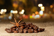 Coffee and Star Anise on sackcloth background with copyspace