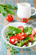 Salad cherry tomatoes , spinach and cheese