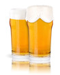 Frosty glass of light beer set isolated