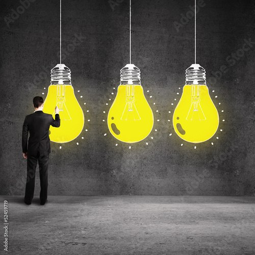 Photo: man drawing bulb man drawing bulb