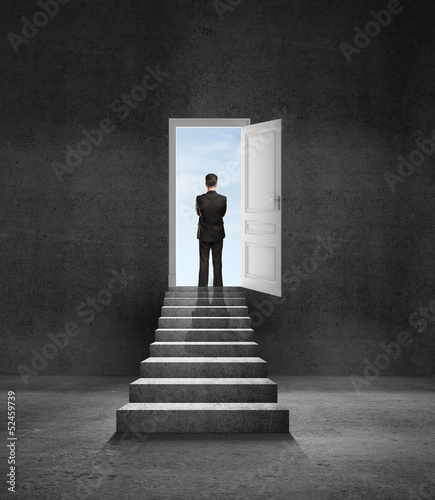 Photo: man and door in wall man and door in wall