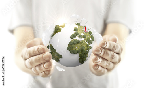 Photo: hands holding earth hands holding earth