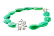 Handmade necklace with green gemstone beads on white background