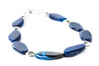 Handmade necklace with blue gemstone beads on white background