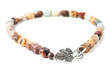 Handmade necklace with brown gemstone beads on white background