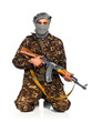 Terrorist with automatic gun on white background