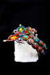 A bracelet is an article of jewelry that is worn around the wris